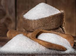 White sugar crystals and cubes